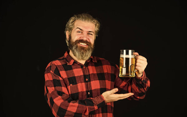 Alcohol beverage. Modern hipster getting drunk. Everything you always wanted in beer. Man hold mug of beer. Hipster at bar counter. Having fun. Brutal bearded man drink beer. Beer pub. Bartender bar