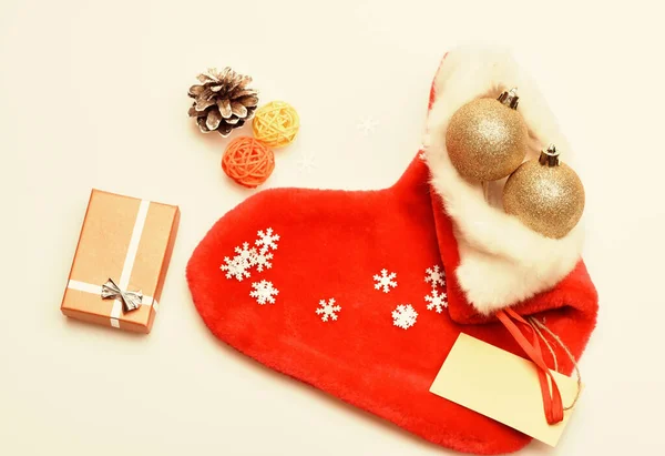 Contents of christmas stocking. Christmas celebration. Christmas sock white background top view. Fill sock with gifts or presents. Small items stocking stuffers or fillers little christmas gifts — Stock Photo, Image