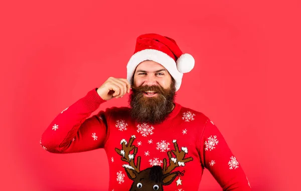 Bearded man santa hat. Emotional hipster with mustache winter sweater. Santa man. New year party. Stay warm in new home this winter. Christmas time. Changes and improvements. Winter holiday fun — Stock Photo, Image
