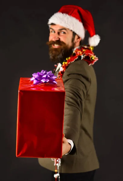 Businessman with smile holds present box in close up — Stock Photo, Image