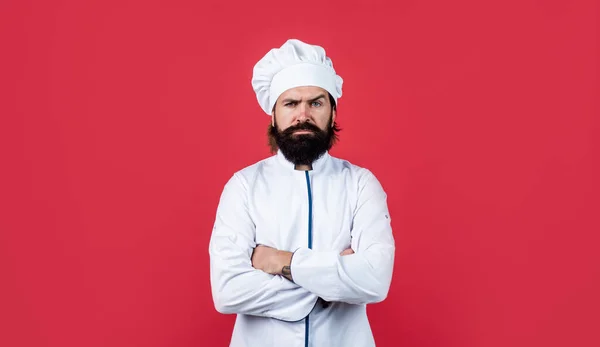 Mooie hipster met baard en snor gekruiste handen, culinair — Stockfoto