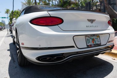 Miami, Florida, USA - July 26, 2025: 2020 Bentley Continental GT convertible car. Luxury white convertible Bentley Continental GT. Car of Bentley Continental GT parked outdoor, back view.