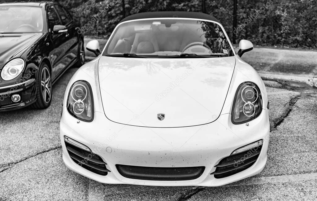 Chicago, Illinois - September 29, 2024: porsche boxter s convertible white. porsche boxter s white parked on the street.