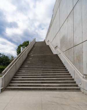 Architecture details. Stairs passage architecture. Detailed architecture. Passage with stairs leading up. Staircase passage outdoor. Staircase in modern building.