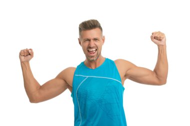 Strong muscular man in sportswear. Fit and active man isolated on white. Sporty man show muscular biceps. Fitness sportswear for man. Active and healthy lifestyle. Fit your body. Sport and fitness.