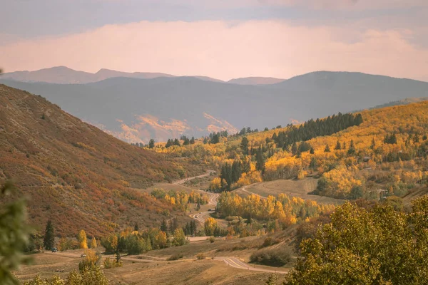 Beautiful mountains in Aspen on the Fall foliage season in September. Colorful trees in the mountains of Colorado state.