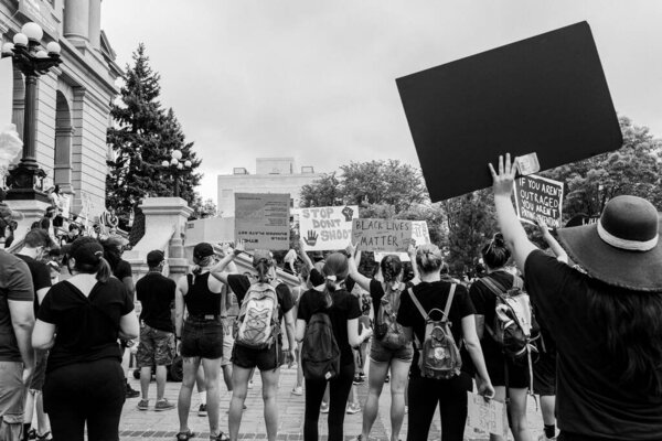 Denver, Colorado, USA. May 31, 2020. Black lives matter. Protests against police brutality. Protest people in front of Capitol. Protesters march t police shooting and killing humans. Racism is alive