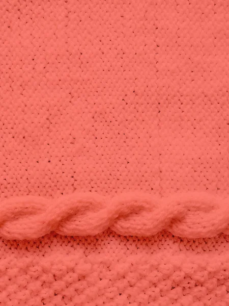 Textura de suéter de lana de punto teñido en Coral vivo . — Foto de Stock