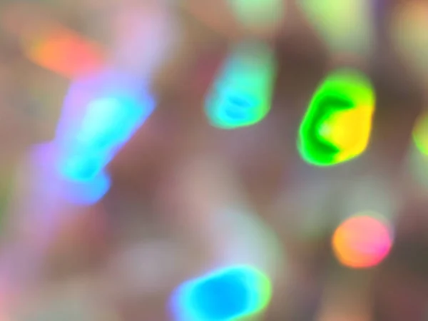 Holografik bokeh yeşil ve sarı ışıklar şenlikli arka plan — Stok fotoğraf