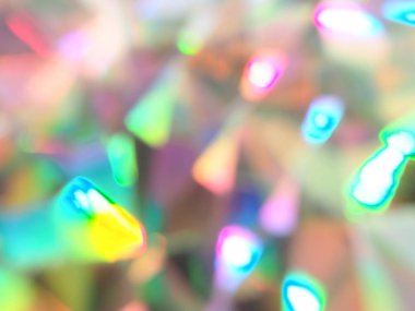 Holografik bokeh yeşil mavi ve pembe ışıklar şenlikli arka plan