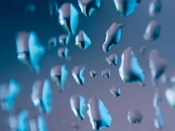Déšť spadne na sklo zblízka — Stock fotografie