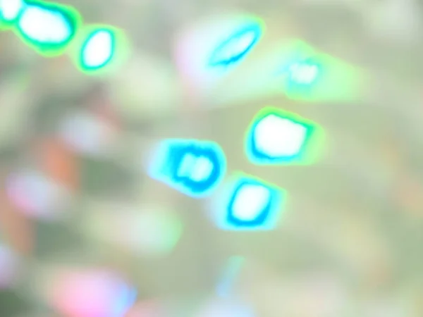 Графический боке зеленый голубой и розовый огни праздничного фона — стоковое фото