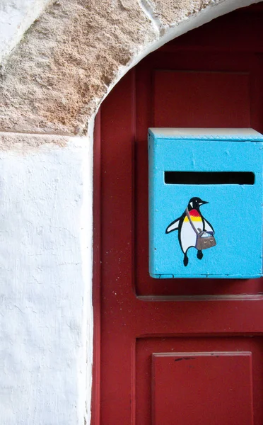 Close View Blue Postal Box Cartoon Penguin Red Door — Stock Photo, Image