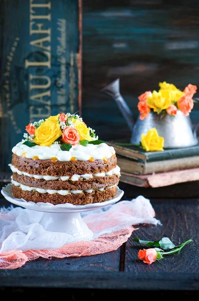 Carrot cake with cream cheese frosting and mango