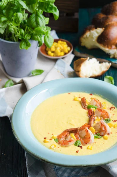 Creamy corn soup with shrimps, sweet corn and chilli