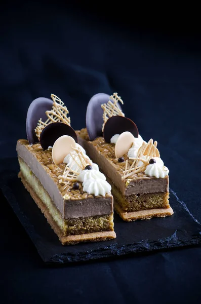 Chocolate mousse cake with coffee cream and crispy layer