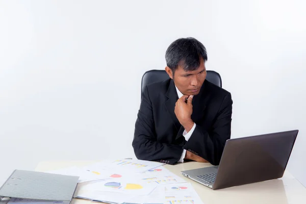 Young businessman working with document desk on white background