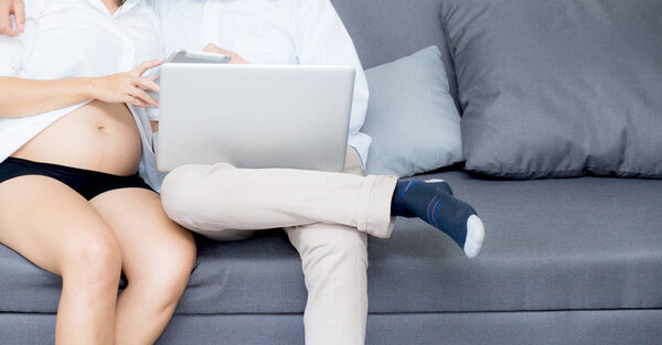 Portrait of a asian young couple husband and wife sitting on the