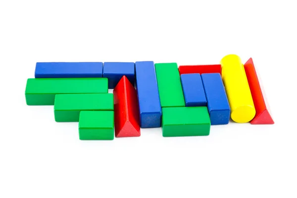 Ladrillos de construcción de edificio multicolor bloque de madera de juguete aislado — Foto de Stock
