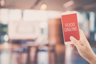 Restauran bulanıklığı ile gıda siparişi online el tutma telefonu