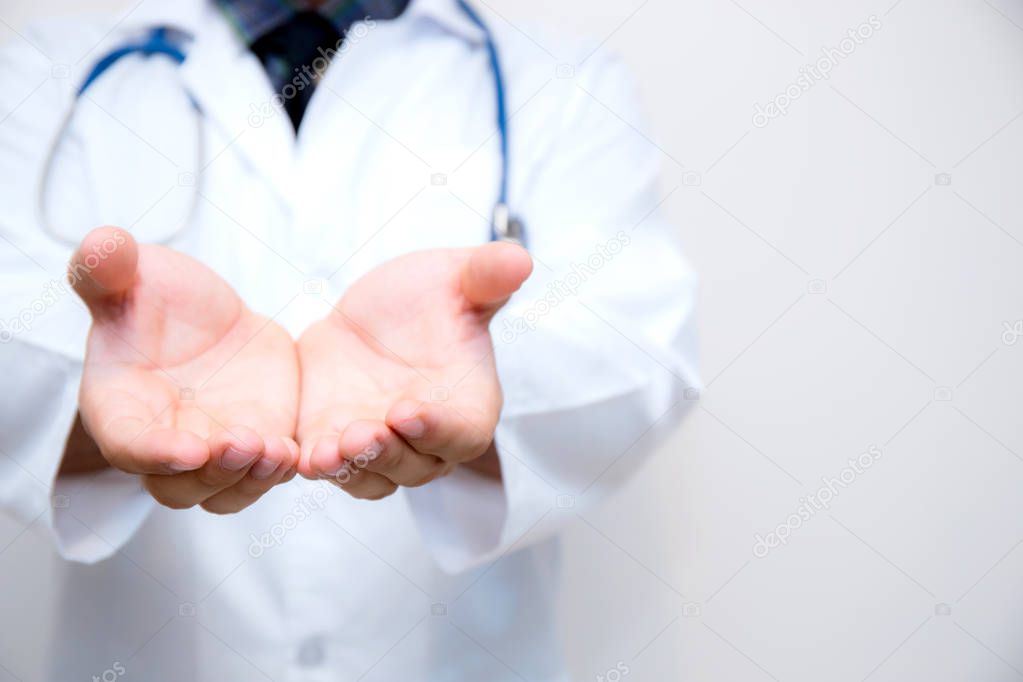 Doctor lman hand with something isolated on white background.