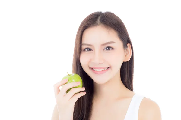 Krásná mladá asijská žena se usmívá a drží zelené jablečné plody — Stock fotografie