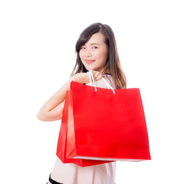 Hermosa de retrato joven mujer sonriendo sosteniendo bolsa de papel isol — Foto de Stock