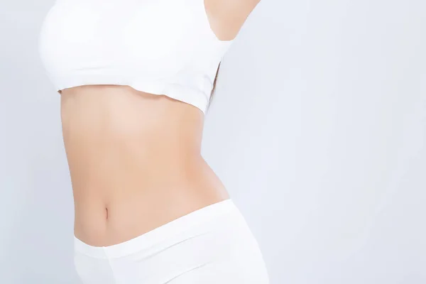 Primer plano asiático mujer hermosa cuerpo dieta con ajuste aislado en whi —  Fotos de Stock