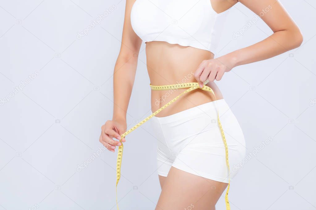 Asian woman diet and slim with measuring waist for weight isolat