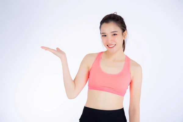 Hermosa retrato asiático mujer en deporte ropa presentando algunos —  Fotos de Stock