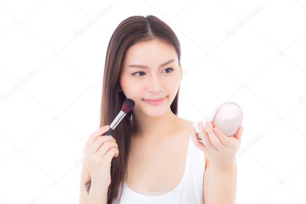 Beauty of portrait asian woman applying make up with brush of ch