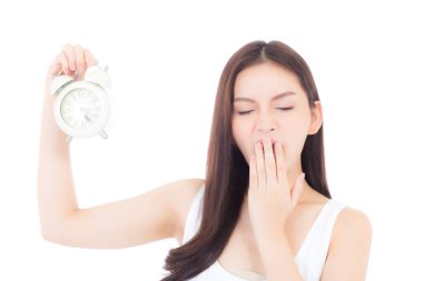 Güzel portre genç asyalı kadın uykulu ile dinlenme esneme olduğunu