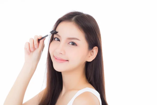 Hermoso retrato joven mujer asiática aplicando ceja o pestaña —  Fotos de Stock
