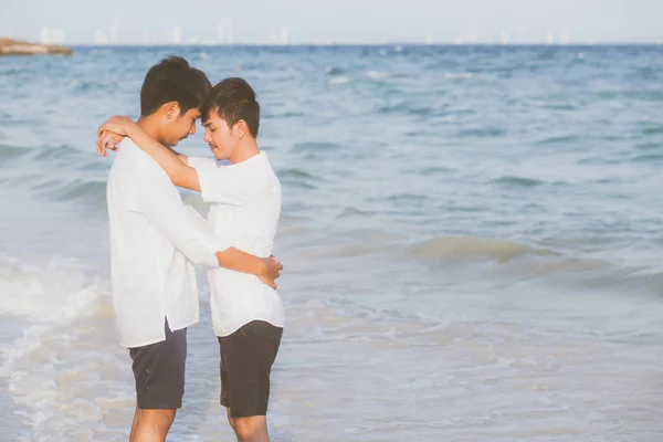 Homosexual portrait young asian couple standing hug together on — Stock Photo, Image