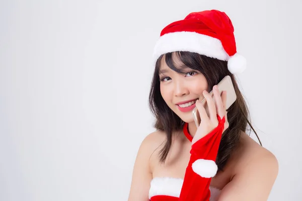 Beautiful portrait young asian woman in Santa talking smartphone — Stock Photo, Image