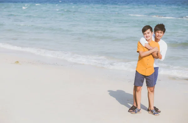 Homosexual portrait young asian couple standing hug together on — Stock Photo, Image