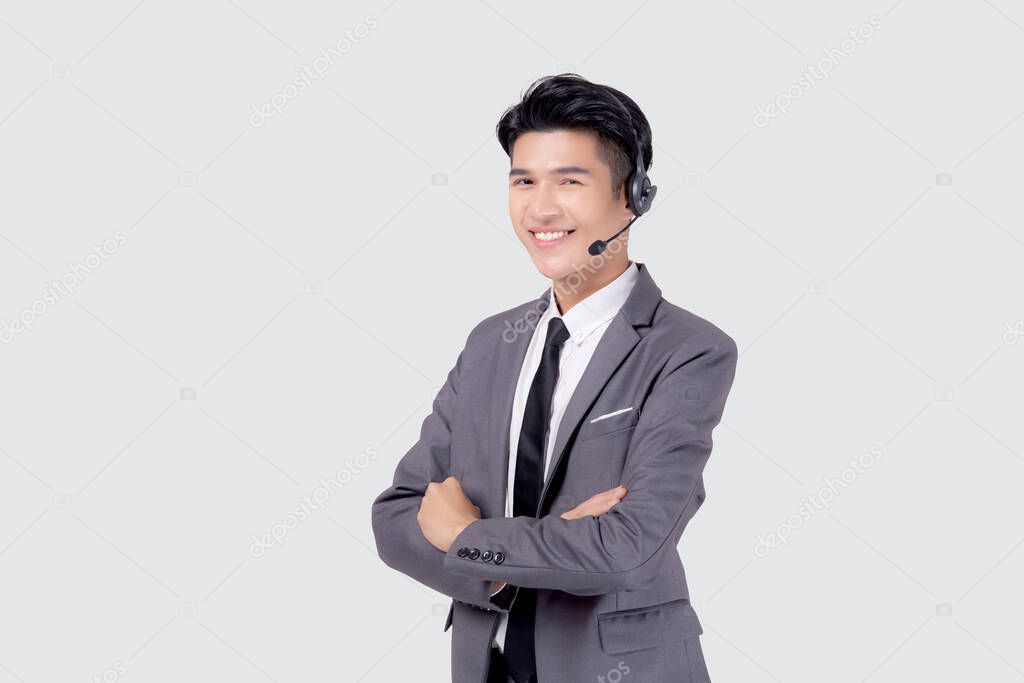 Portrait young asian business man call center wearing headset isolated on white background, agent with support and service, businessman is assistant for client with phone or helpline online.