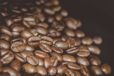 Kavrulmuş kahve çekirdekleri, arka plan olarak kullanılabilir.