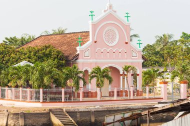 Katolik Kilisesi tarafından nehrin Mekong Delta Cai bölgesinde Cai olması gereken kasaba ve Güney Vietnam yüzen Pazar yakın olması.