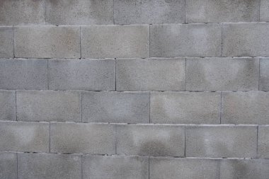 Taş zemin. Gri havalandırmalı taş çit. Wiew 'i kapat.