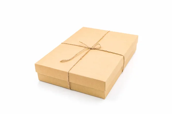 Brown paper box, tied with string. — Stock Photo, Image