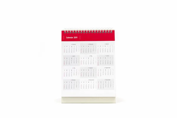 Libro bianco scrivania calendario a spirale 2019 su sfondo bianco . — Foto Stock