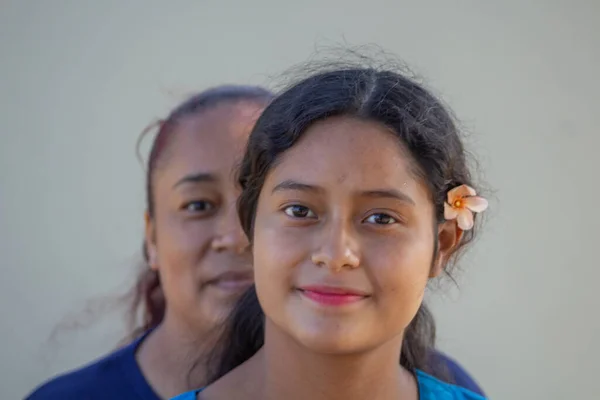 portrait of mexican mom and daughter with latin appearance