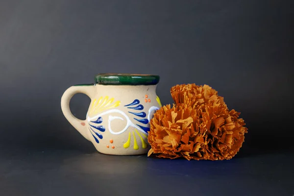 Mexican mug, cempasuchil flower as decoration for the day of the dead, Mexican holiday