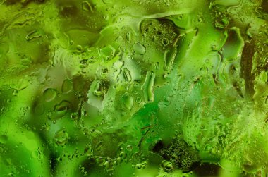 Güzel sıvı arka plan. Farklı damlaile arka plan. Yeşil ve su elementleri.  