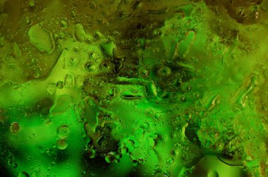 Güzel sıvı arka plan. Farklı damlaile arka plan. Yeşil ve su elementleri.  