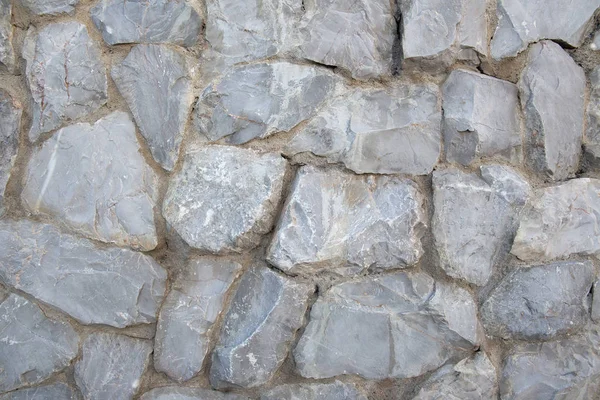 Внешний вид стен из натурального серого камня. Текстура натурального серого камня . — стоковое фото