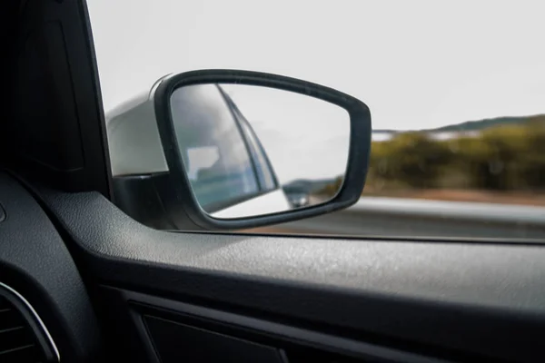 road view from the rearview mirror