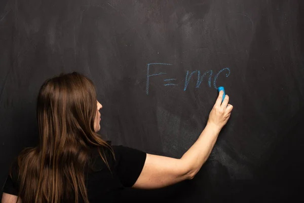 Physical Formula Einstein Theory Written Young Girl Blue Chalk Blackboard — Stock Photo, Image