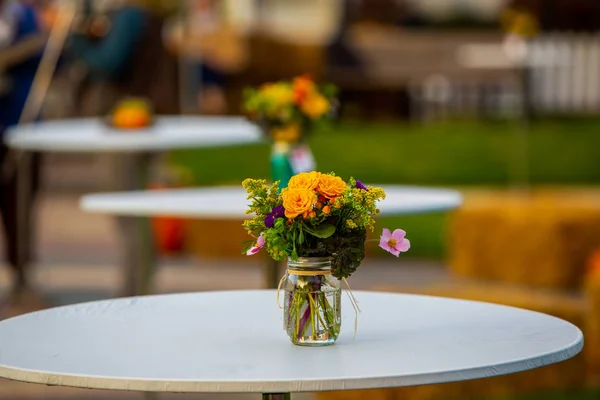 Fall Flower Arrangement on table at /harvest Moon Festival